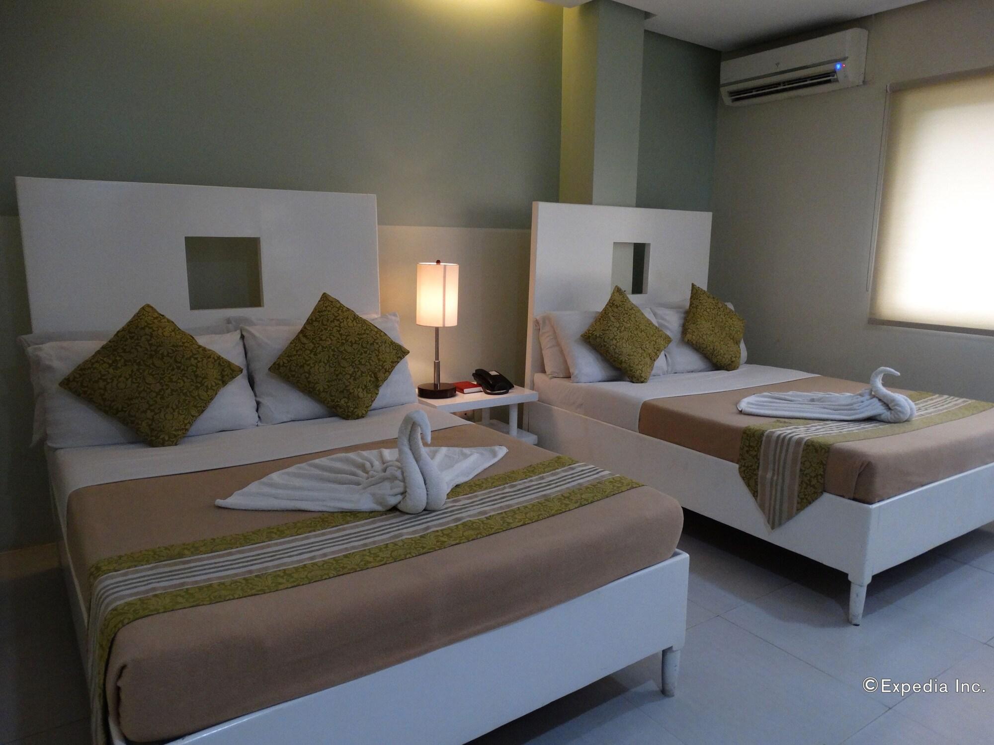 Empire Suites Hotel Puerto Princesa Exterior foto