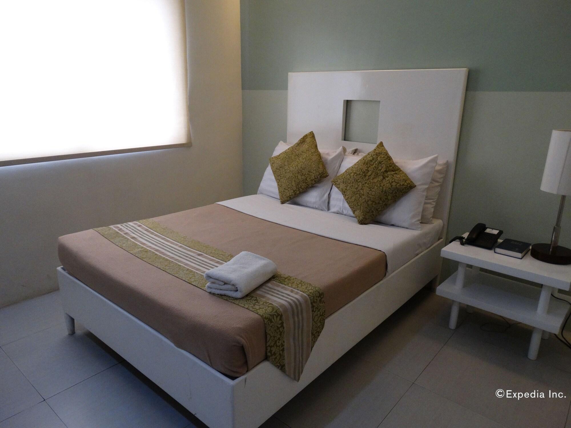 Empire Suites Hotel Puerto Princesa Exterior foto